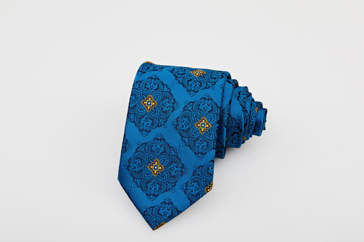 Cravată albastră cu motive bleumarin și galben