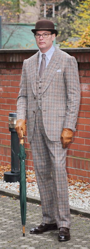 gentleman-with-unbottoned-waistcoat-button